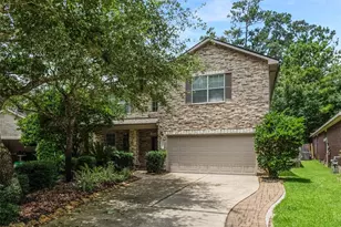 7 Ebony Oaks Pl, Spring, TX 77382 - Photo 1