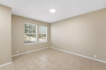 4706 Woodspring Glen Lane, Houston, TX 77345 - Photo 11