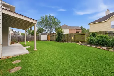 21594 Tims Harbor Drive, Kingwood, TX 77339 - Photo 25