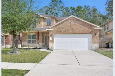 9587 E Woodmark, Conroe, TX 77304 - Photo 1
