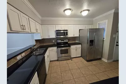 5661 Birchmont Drive #E, Houston, TX 77091 - Photo 1