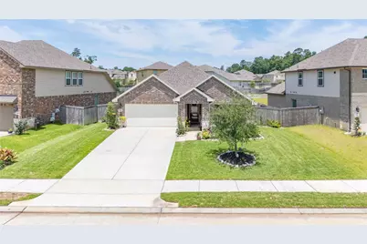 7045 Lauren Oak Drive, Conroe, TX 77304 - Photo 1