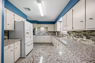 7719 Wilmerdean Street, Houston, TX 77061 - Photo 13
