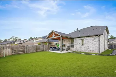 35425 Woodtrace Circle, Pinehurst, TX 77362 - Photo 29