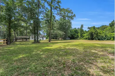 33102 Rollingwood Drive, Pinehurst, TX 77362 - Photo 33