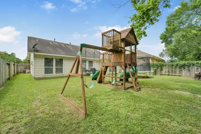 12023 Belle Court, Pinehurst, TX 77362 - Photo 29