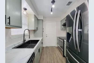 7907 Rumbling Wood Court, Houston, TX 77086 - Photo 9