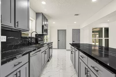 13042 Richmond Avenue, Houston, TX 77082 - Photo 9