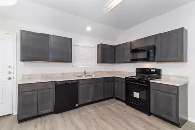 8639 Middleton Oaks Circle, Houston, TX 77028 - Photo 1