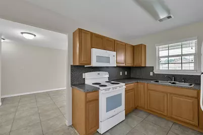 167 S Bend Court #A, Willis, TX 77378 - Photo 5
