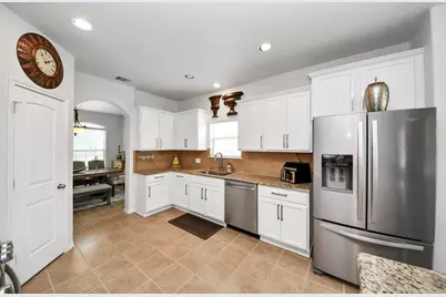 8519 E Windhaven Terrace Trail, Cypress, TX 77433 - Photo 15