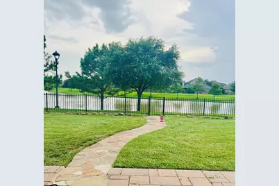 8519 E Windhaven Terrace Trail, Cypress, TX 77433 - Photo 49