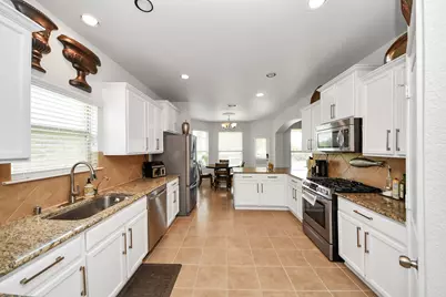 8519 E Windhaven Terrace Trail, Cypress, TX 77433 - Photo 13