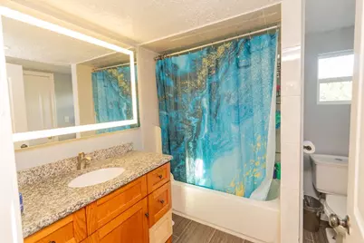 704 County Road 3554, Cleveland, TX 77327 - Photo 9