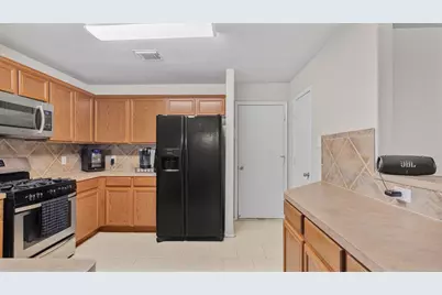 12707 Sandbur Valley Way, Houston, TX 77045 - Photo 13