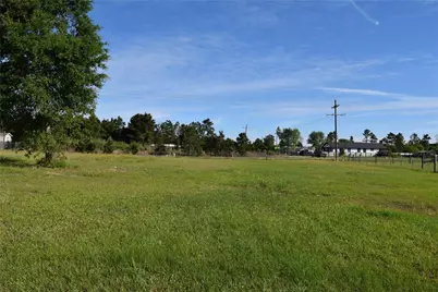 1129 County Road 5100, Cleveland, TX 77327 - Photo 9