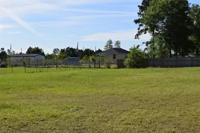 1129 County Road 5100, Cleveland, TX 77327 - Photo 11