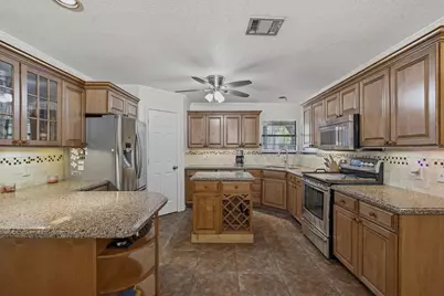 10985 Woods Lane, Cleveland, TX 77328 - Photo 13