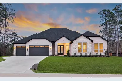 316 Louvenia Court, Pinehurst, TX 77362 - Photo 1
