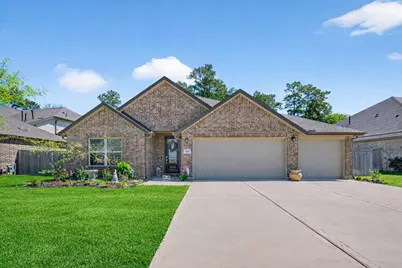725 Ivory Creek Court, Willis, TX 77378 - Photo 1