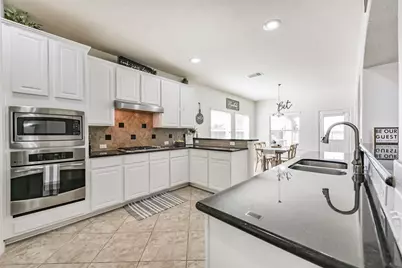 9719 Wincrest Drive, Mont Belvieu, TX 77523 - Photo 13