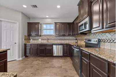 10015 S Redfish Drive, Hitchcock, TX 77563 - Photo 19