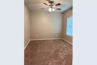 15002 Sorrento Bay Court, Willis, TX 77318 - Photo 11