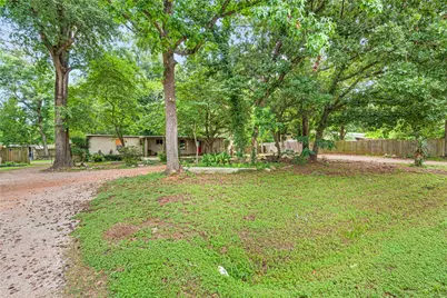 402 Baltzell Drive, Pinehurst, TX 77362 - Photo 1