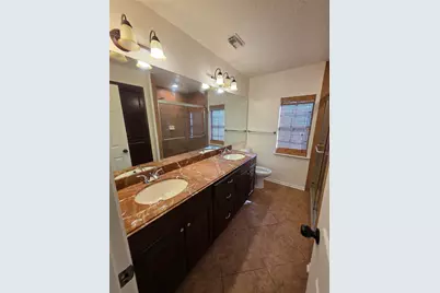 8819 Rocky Valley Drive, Houston, TX 77083 - Photo 15