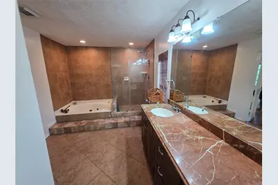 8819 Rocky Valley Drive, Houston, TX 77083 - Photo 27