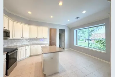 23639 Hawkins Creek Court, Katy, TX 77494 - Photo 13
