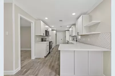 9642 Meadowglen Lane, Houston, TX 77063 - Photo 1