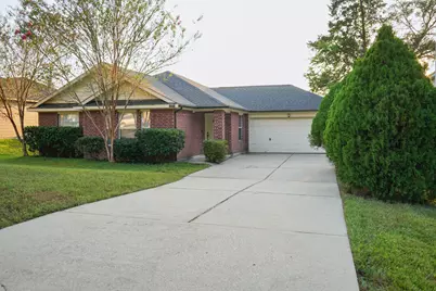 14091 Running Bear Drive, Willis, TX 77378 - Photo 1