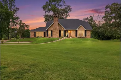 330 W Pineshadows Drive, Sour Lake, TX 77659 - Photo 1