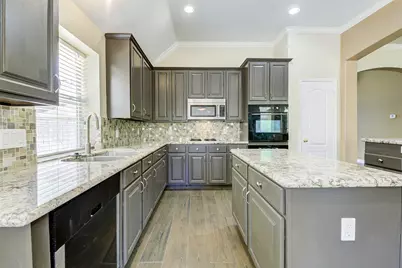 14407 Jessica Falls Circle, Houston, TX 77044 - Photo 9