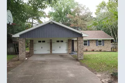 12519 Woodlake Street, Pinehurst, TX 77362 - Photo 1
