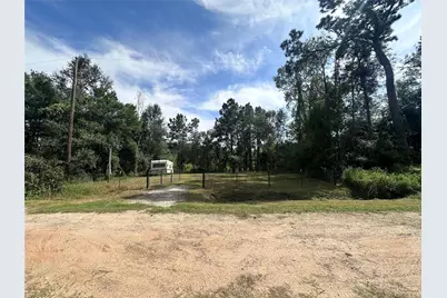 11008 Redbud  Dr, Conroe, TX 77302 - Photo 1