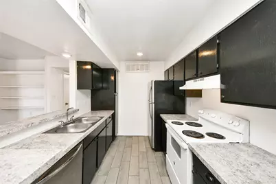 12905 Woodforest Boulevard #712, Houston, TX 77015 - Photo 13