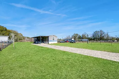 597 County Road 3406, Cleveland, TX 77327 - Photo 3