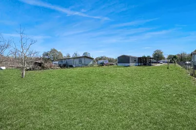 597 County Road 3406, Cleveland, TX 77327 - Photo 5