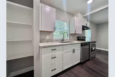 207 S Avenue A #A, Willis, TX 77378 - Photo 7