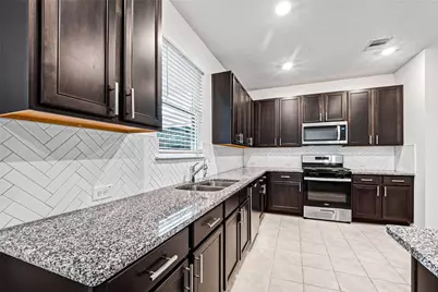 15723 Autumn Chicory Drive, Houston, TX 77044 - Photo 7