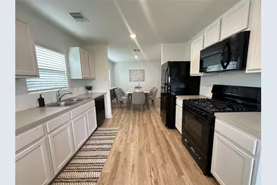 11079 N Lake Mist Lane, Willis, TX 77318 - Photo 11