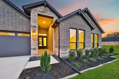 343 Louvenia Court, Pinehurst, TX 77362 - Photo 1