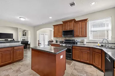 9642 Keeneland Circle, Mont Belvieu, TX 77523 - Photo 19