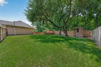 12202 Coachman Lane, Pinehurst, TX 77362 - Photo 29
