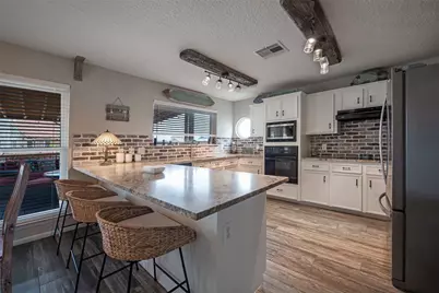 207 Easterly Drive, Tiki Island, TX 77554 - Photo 13