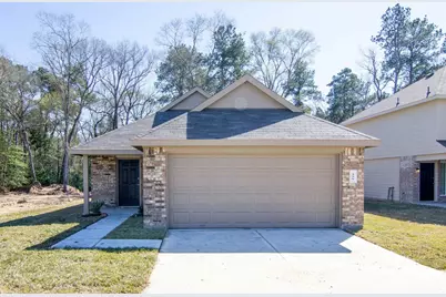329 North Meadows Drive, Willis, TX 77378 - Photo 1