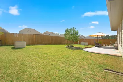 1409 Northwood Bluff Lane, Pinehurst, TX 77362 - Photo 23