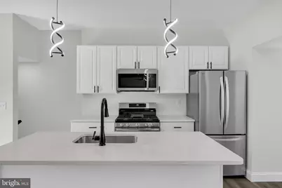 738 E 37th Street, Baltimore, MD 21218 - Photo 1